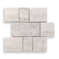 two blocks of white traver stone are arranged in the shape of a rectangle