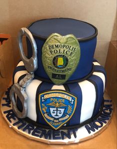 a police cake with handcuffs on top