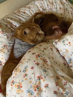 a person laying in bed with a stuffed animal