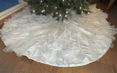 a christmas tree skirt is on the floor