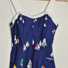 1980s Nautical Cotton Blend Dress With Stretch Smocked Sides & Pockets. Size 8. Tags Attached. Navy Marine Style Summer Dress, Blue Nautical Dress For Summer, Navy Retro Summer Dress, Blue Nautical Summer Dress, Blue Marine Style Summer Dress, Nautical Dresses For Summer Vacation, Nautical Style Summer Vacation Dresses, Fitted Nautical Summer Dress, Summer Nautical Style Fitted Dress