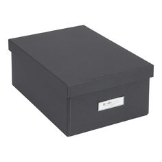 a black box with a silver label on it