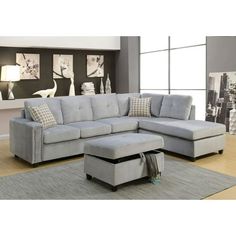 a living room with a sectional couch and ottoman