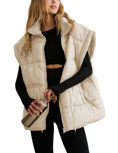 PRICES MAY VARY. Material: classic versatile puffy vest for women, lightweight warm black sleeveless padded gilet, made of soft, skin-friendly high quality polyester fabric, comfy to wear, keeping you warm during chilly days Features: womens full zip thick quality padded vest, adjustable drawstring waistband, stand collar, two side pockets, slight exaggerated shoulders, solid color, oversized style with a slouchy fit, stylish basic sleeveless padded coat allows most types of bodyshape Matching: Oversized Puffer Vest, Winter Puffer Vest, Oversized Puffer, Brown Zip Ups, Padded Vest, Quilted Puffer Vest, Black Puffer Vest, Winter Vest, Puffy Vest