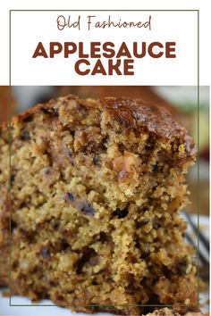 a close up of a piece of cake on a plate with the words old fashioned apple sauce cake