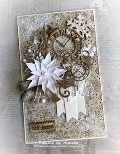 a close up of a greeting card with snowflakes on it and a clock