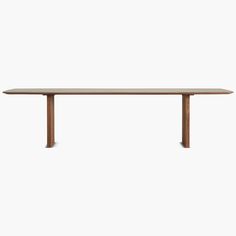 a long wooden table on a white background