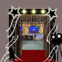 an open door leading to a red carpeted area with stars and film reels