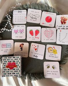 the cards have hearts and animals on them, along with other magnets for valentine's day