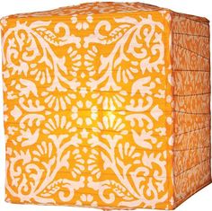 an orange and white box with designs on it