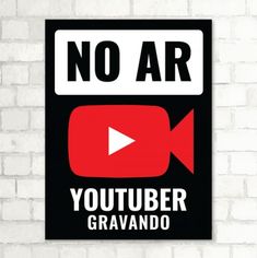 a sign that says no ar youtuber gravando on the side of a brick wall