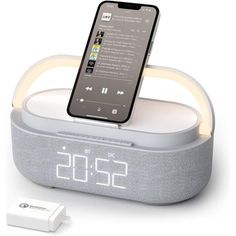 an alarm clock with a cell phone in it