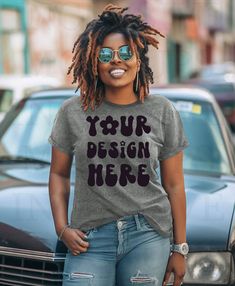 a woman with dreadlocks wearing a t - shirt that says your design here