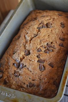 a loaf of chocolate chip bread in a pan