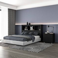 a modern bedroom with black and white decor