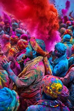 a group of people covered in colored powder