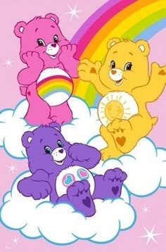 three teddy bears sitting on top of a cloud with a rainbow in the sky behind them