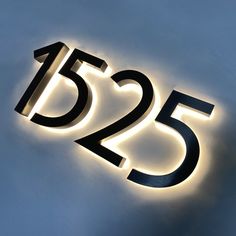 a close up of a sign with the number twenty five