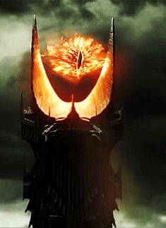 the dark knight rises movie poster with an evil face on it's head and flames coming out of its mouth