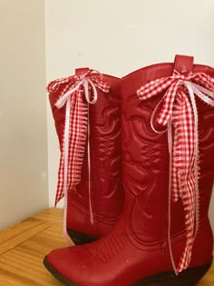 Red Cowboy Boots Bedazzled, Boot Ribbon Ideas, Ribbon On Cowgirl Boots, Game Day Boots Ribbon, Decorated Cowboy Boots, Red And White Cowboy Boots, Ribbons On Cowboy Boots, Red Cowgirl Boots Aesthetic, Bows On Boots