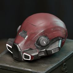 an iron man helmet on top of a metal box