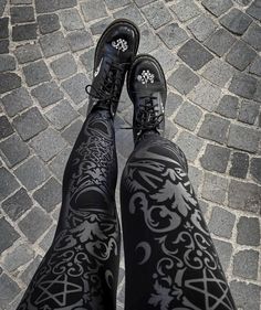 Baroque Crescent Leggings Stylish, sexy high-waisted gothic leggings with a stunning dark vibe. Silkscreened with a beautifully ornate witchy design of symbols and patterns in silver, they are also made from 100% quality breathable cotton, so they move with you. An elasticated waistband adds to the ultimate comfort. A must-have basic for day or night. Material: 100% Soft Cotton. Size Waist Thigh Knee Length XS 60cm/23.6" 42cm/16.5" 27cm/10.6" 93cm/36.6" S 62cm/24.4" 44cm/17.3" 28cm/11.0" 93cm/36 Steam Punk Leggings, Skelton Leggings, Occult Leggings, Pentagram Leggings, Angel Leggings, Gothic Tights, Goth Leggings, Cool Leggings, Gothic Leggings