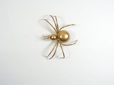 Antique spider brooch, Brass brooch spider, Vintage brass insect pin, Metal spider  Wonderful spider brooch from the beginning of the 20th century. Precisely made brass, eyes are supposed by natural crystal or jewelery glass. NOTE - The brooch is without a needle. All photos are real. FOR MORE DETAILS, PLEASE LOOK AT THE PICTURES. If you have any questions please email me. PAYMENT We accept PayPal and credit/debit cards. Estimated shipping times: Canada: 10-20 business days Japan: 10-20 business days United States: 10-25 business days Europe: 4-14 business days Australia, New Zealand and Oceania: 15-30 business days Asia Pacific: 15-30 business days Latin America and the Caribbean: 15-30 business days North Africa and the Middle East: 15-30 business days. Thank you for visiting my store. P Spider Vintage, Metal Spider, Brass Brooch, Spider Brooch, Rustic Jewelry, Debit Cards, The 20th Century, Natural Crystals, Vintage Brass