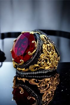 Rococo Style,Baroque Ornate, Oval Red Stones Ring, 925 Sterling Silver, 24 Carat Gold Plated,Hand Carved, Art Deco Rings, Gift For Men   PRODUCT DETAILS * Made to Order * Certified 925 sterling silver * Your ring comes in a pretty ring box ready for gift giving. RING SIZE *It is always safer to see a jeweler to have a more precise idea about your ring size. However, if it is not possible please look at our ring size chart in the pictures. There you can also find the size conversions. *If your ri Luxury Oval Cabochon Men's Ring For Gift, Luxury Elegant Men's Ruby Ring, Luxury Ruby Men's Ring As Gift, Luxury Handmade Ruby Men's Ring, Luxury Handmade Ruby Ring, Red Gemstone Rings For Ceremonial Occasion, Red Gemstone Ring For Ceremonial Occasions, Ceremonial Red Gemstone Ring, Luxury Engraved Ruby Ring