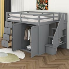 a loft bed with stairs is shown in this room, and it has drawers underneath the bed