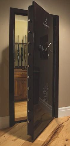 Browning Universal Vault Door - Out-Swing 84.00" x 38.13" - 2022 Model For gun owners, having a place to store their guns in a safe and organized manner is very important. You don't want guns to just lie around the house because of the chance that a child may get their hands on these dangerous weapons. Additionally, you also want your guns to be hidden to keep them from being stolen by intruders or worse, used against you. That is why many people use gun safes to organize and hide their guns. Br Safe Room Doors, Lego Helicopter, Safe Door, Panic Rooms, Secret Passages, Safe Vault, Vault Doors, Nightclub Design, Safe Room