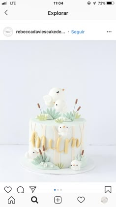 a cake with white frosting and flowers on top is displayed in an instagram