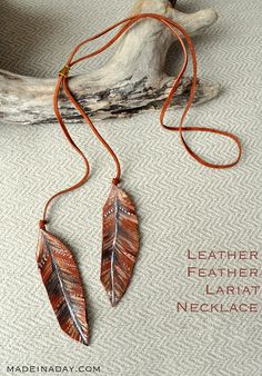 leather feather lariat necklace with free people hacks on the front and back