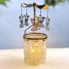 a glass jar with some metal items in it