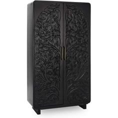 an ornate black cabinet with carvings on the front and sides, one door open to reveal a