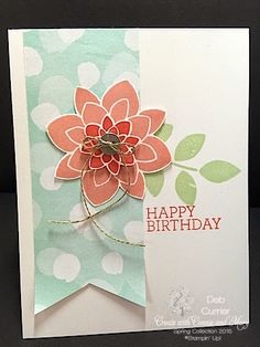 a birthday card with a flower on it