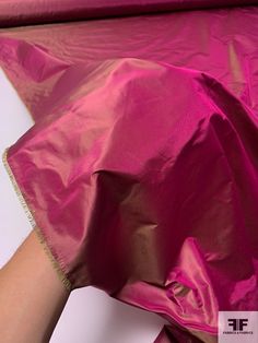 This elegant silk taffeta features a plum color with a tint of green. Renowned for its crisp drape, silk taffeta is a popular choice for gowns, dresses, and skirts. This fabric is opaque, therefore a lining is not needed unless additional structure is desired. Content: 100% Silk Color: Plum Width: 55 inches Taffeta Fabric, Fashion District, Silk Taffeta, Wide Stripes, Sewing Design, Stripe Silk, Plum Color, Silk Charmeuse, Nyc Fashion