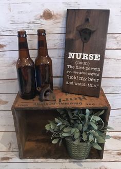 a wooden sign that says nurse and three beer bottles sitting on top of a shelf