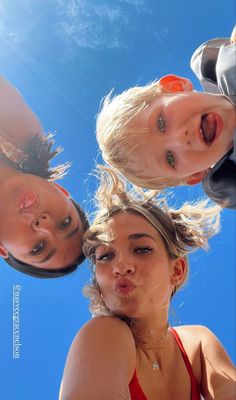 three people are standing in front of the camera with their heads tilted to the side