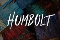 the word humbott is surrounded by brush strokes and colors that appear to be painted