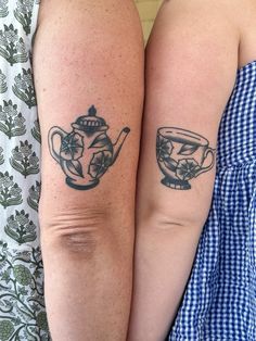 two people with matching tattoos on their arms, one has a teapot and the other has a cup