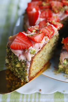 a slice of cake with strawberries on top