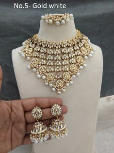 *Light Weight Gold Kundan Adjustable necklace set with earrings and tikka. *Studded with kundan stone. *Light Weight Gold kundan necklace. *Necklace width-  4 inches (included pearl drop) *Earrings Length- 2.2 inches(included pearl drop) *Earrings dome size- 1 inches Gold Dual-tone Kundan Necklace For Wedding, Elegant Dual-tone Kundan Necklace For Ceremonial Occasion, Bollywood Style Dual-tone Kundan Necklace For Wedding, Bollywood Style Dual-tone Kundan Bridal Necklace, Elegant Kundan Dual-tone Bridal Necklace, Necklace Set Indian, Kundan Necklaces, Adjustable Necklace, Bridal Necklace