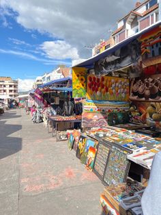 an outdoor market with many different items on display