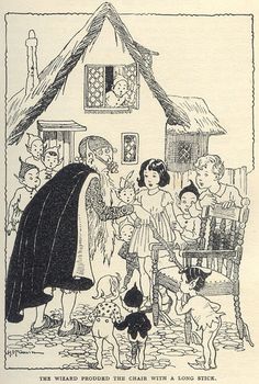 an old book with children in front of a house and dog on the ground next to it