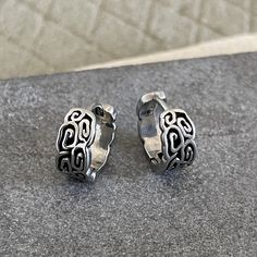 Elevate your look with these unique Norse patterned huggie hoops designed for men in high-quality titanium. These stylish earrings blend modern design with traditional Norse patterns, making them a standout accessory for any occasion. Whether you're looking to add a touch of masculinity to your outfit or simply express your love for Nordic culture, these huggie hoops are the perfect choice. Make a bold statement with these durable and lightweight titanium earrings that are sure to turn heads wherever you go. A must-have for any man who appreciates both style and craftsmanship. ▪️▪️▪️PRODUCT Sold by Pair = 2pcs Hypoallergenic, Lead & Nickel Free Inner Hoop Size 10mm, Outer Hoop 13mm Hoop Width 5mm Earring post 18g=1.0mm VISIT STORE FOR MORE PRODUCT 🔗 https://www.etsy.com/ca/shop/TWISTEEL ▪ Mens Thick Hoop Earrings, Mens Earrings Hoop Silver, Mens Silver Hoop Earrings, Mens Viking Earrings, Mens Earrings Hoop, Titanium Jewelry, Titanium Earrings, Mismatched Earrings, Stylish Earring