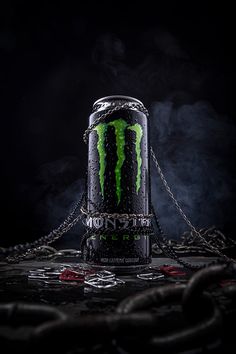 a can of monster energy drink with chains around it