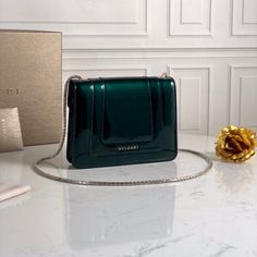 Size: 20cm*14.5cm*5cm It comes with Dust box, Care manual, Tag, and Paper bag. High-end Pouch Bag For Gift, Gift Box Bag With Original Box In Pouch Shape, High-end Pouch Shoulder Bag As Gift, Designer Green Pouch Box Bag, High-end Clutch As A Gift, High-end Rectangular Case Bags As Gifts, High-end Rectangular Case Bag As Gift, Designer Rectangular Box Bag With Case Included, Designer Rectangular Case Party Bag