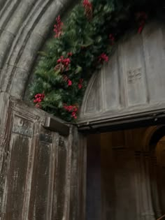 an old building with flowers growing out of it