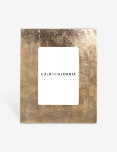 a gold frame with the words luu and georgia on it