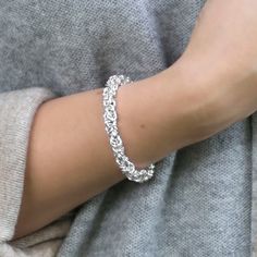 "Our stunning Sterling Silver Soft Circles Bracelet is simply a joy to wear. Each link in this bracelet comprises of 8 circles linked together which produces an elegant and luxurious look. There are additional links at the end of the bracelet enabling it to be worn at lengths from 7\" to 8\" and the loose link design gives the bracelet a soft and fluid feel. In addition, each bracelet has been hallmarked by the Birmingham assay office All Martha Jackson jewellery comes in a gift box with a blank gift card for you to write a message on Dimensions length 7\" to 8\". Width 0.6cm" Sterling Silver Bracelets Women, Bracelets Women, Silver Bracelets For Women, Circle Bracelet, Link Design, Climber Earrings, Loop Earrings, Simple Bracelets, Knot Earrings